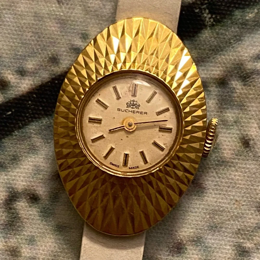 Vintage Bucherer interchangeable face and straps watch.